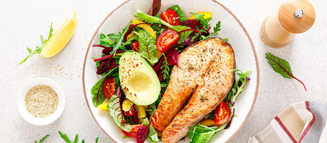 salad with honey-mustard-dressing and panfried salmon