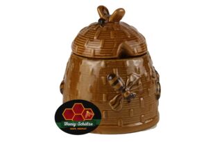 forest honey in rustic ceramic beehive